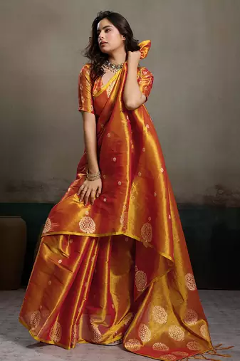 women rust orange woven tissue silk blend saree with mandala motifs