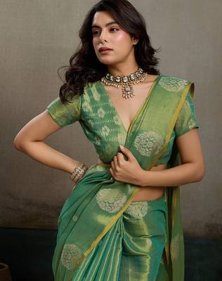 women sea green woven tissue silk blend saree with mandala motifs 5