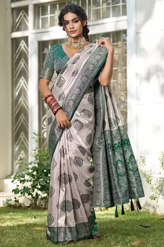 women's beige banarasi silk blend saree with dark green border 