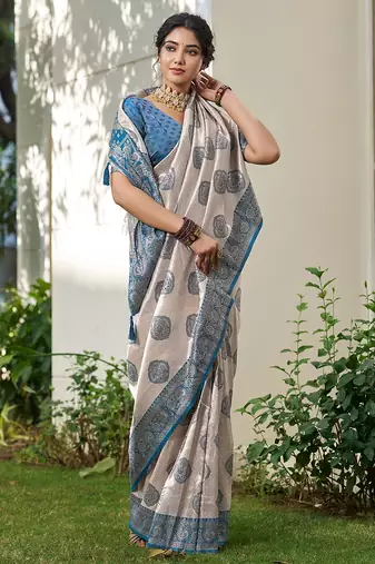 women's beige banarasi silk blend saree with blue border 