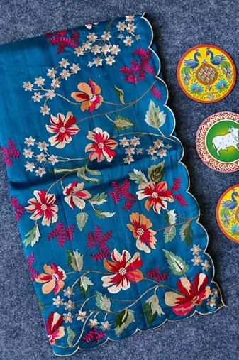 Teal matka silk saree  with heavy floral embroidery border with running blouse