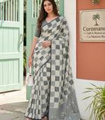 Sutriti women sage green & grey checked linen saree with floral pallu
