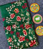 Green matka silk saree  with heavy floral embroidery border with running blouse