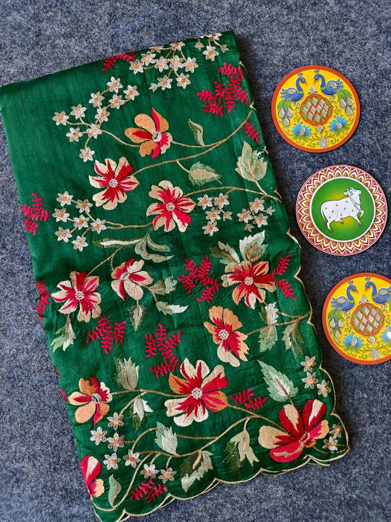Green matka silk saree  with heavy floral embroidery border with running blouse