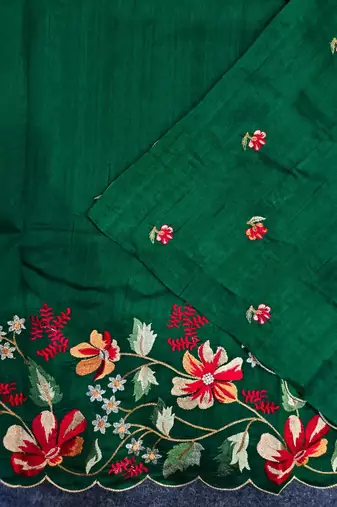 Green matka silk saree with heavy floral embroidery border with running blouse