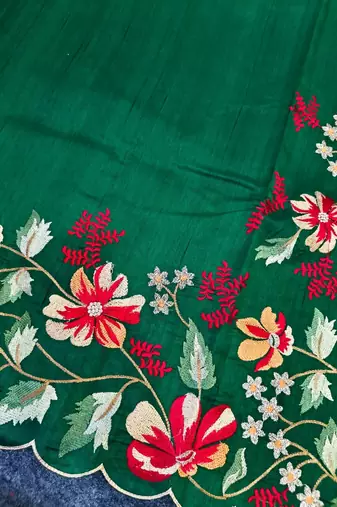 Green matka silk saree with heavy floral embroidery border with running blouse