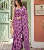 women pink & purple checked linen saree with floral pallu