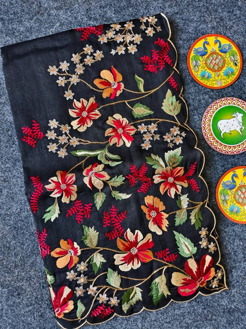 Black matka silk saree  with heavy floral embroidery border with running blouse