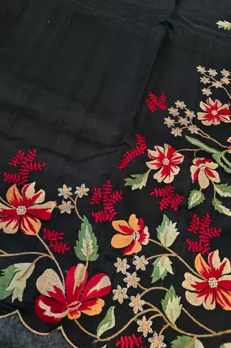 Black matka silk saree with heavy floral embroidery border with running blouse