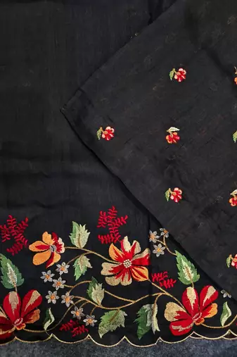 Black matka silk saree with heavy floral embroidery border with running blouse