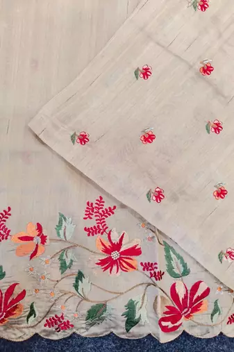 Beige matka silk saree with heavy floral embroidery border with running blouse