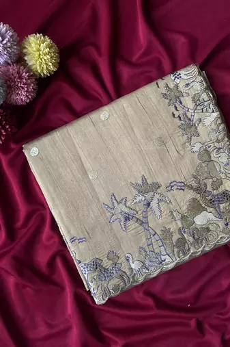 Grey  matka silk saree  with heavy floral embroidery border with running blouse