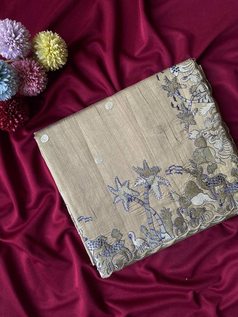 Grey  matka silk saree  with heavy floral embroidery border with running blouse