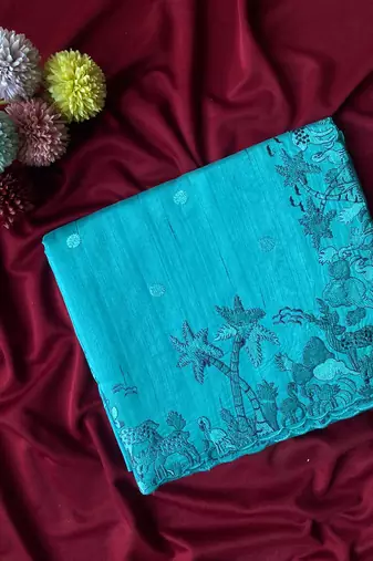 Teal matka silk saree  with heavy floral embroidery border with running blouse