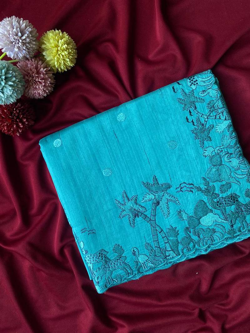 Teal matka silk saree  with heavy floral embroidery border with running blouse