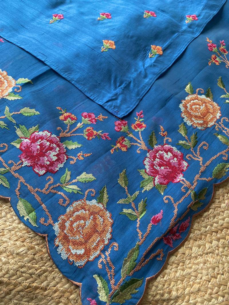 Teal matka silk saree  with heavy floral embroidery border with running blouse