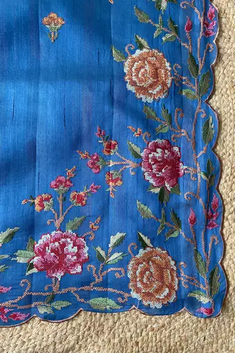 Teal matka silk saree with heavy floral embroidery border with running blouse