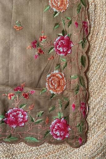 Brown matka silk saree  with heavy floral embroidery border with running blouse