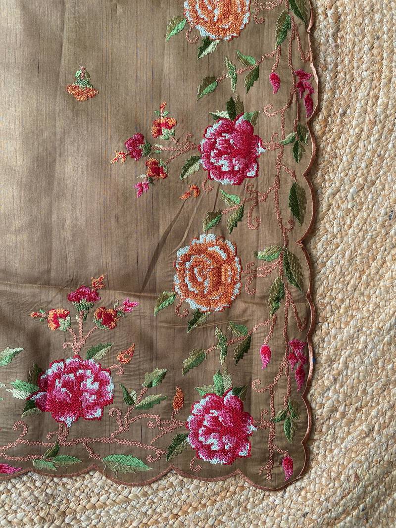 Brown matka silk saree  with heavy floral embroidery border with running blouse