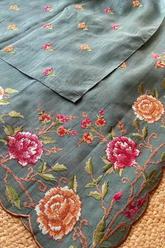 Sea green matka silk saree  with heavy floral embroidery border with running blouse