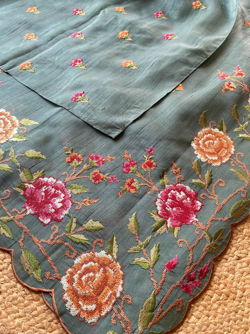 Sea green matka silk saree  with heavy floral embroidery border with running blouse