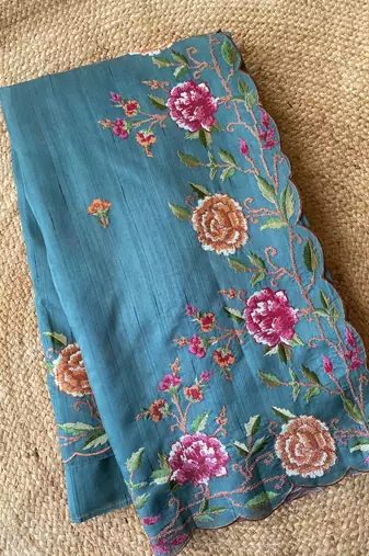 Sea green matka silk saree with heavy floral embroidery border with running blouse