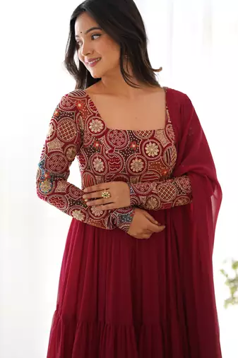 Maroon color faux georgette heavy multi thread work functional wear gown