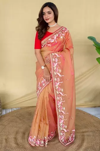 Peach royal gabanna silk saree woven in a shiny dual-tone finish