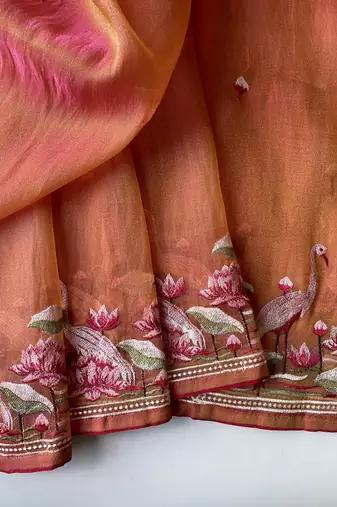 Peach royal gabanna silk saree woven in a shiny dual tone finish