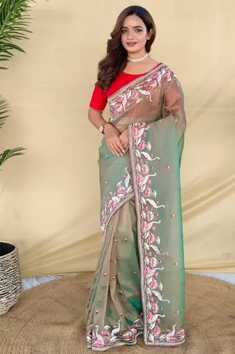 Green royal gabanna silk saree woven in a shiny dual-tone finish