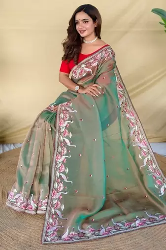 Green royal gabanna silk saree woven in a shiny dual tone finish
