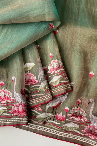 Green royal gabanna silk saree woven in a shiny dual tone finish