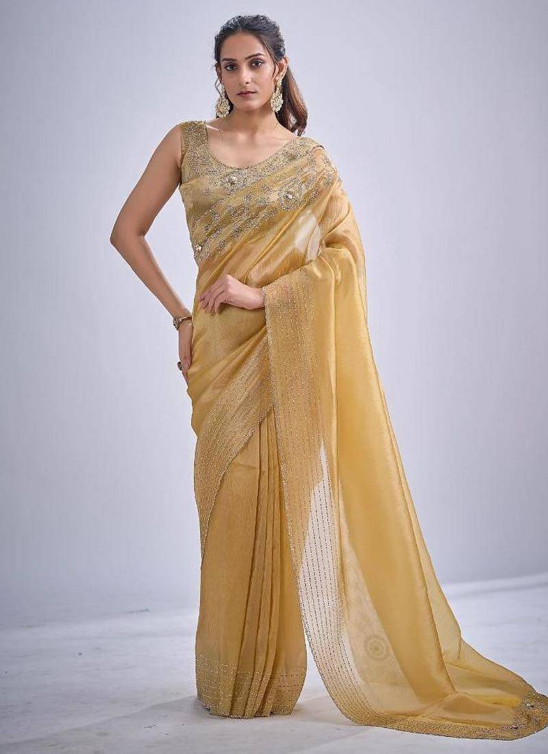 Musturd color kanjivaram pure silk zircon cutdana & sequence handwork saree