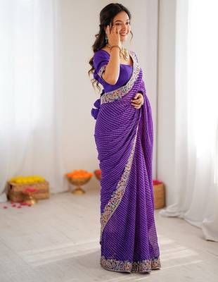 Purple faux georgette bandhni print & embroidered border saree 3