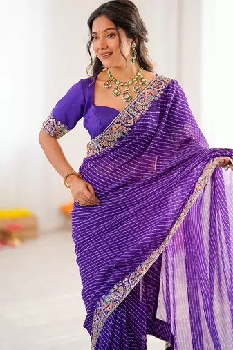 Purple color faux georgette bandhni print & embroidered border saree