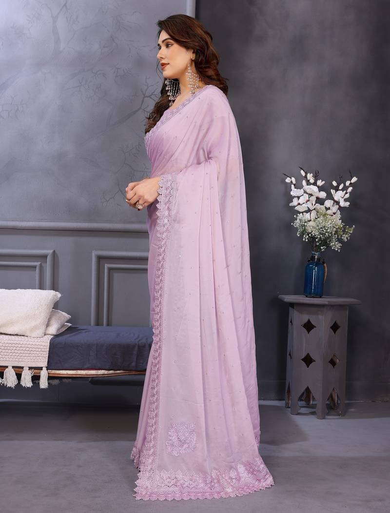 Pink rangoli silk saree with sequence embroidery lace border and matching blouse piece