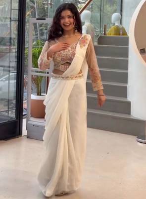 Cream georgette embroidered saree 2
