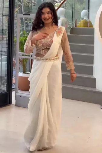 Cream georgette embroidered saree