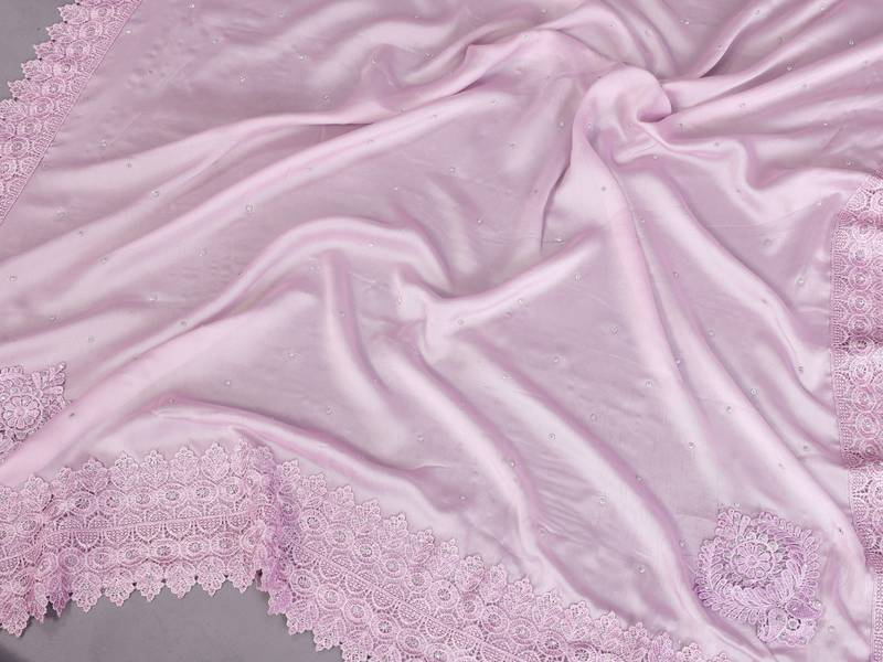 Pink rangoli silk saree with sequence embroidery lace border and matching blouse piece