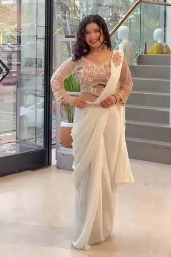 Cream georgette embroidered saree