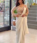 Cream georgette embroidered saree