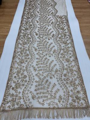 Cream net embroidered saree 3