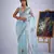 Sea green organza printed saree