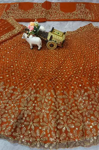 orange net embroidered lehenga set