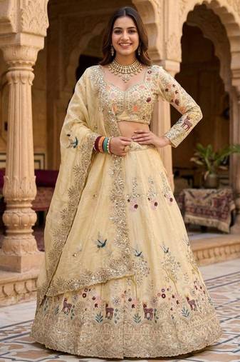 beige silk blend embroidered lehenga set with free size upto 44