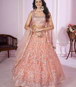 peach net embroidered lehenga set