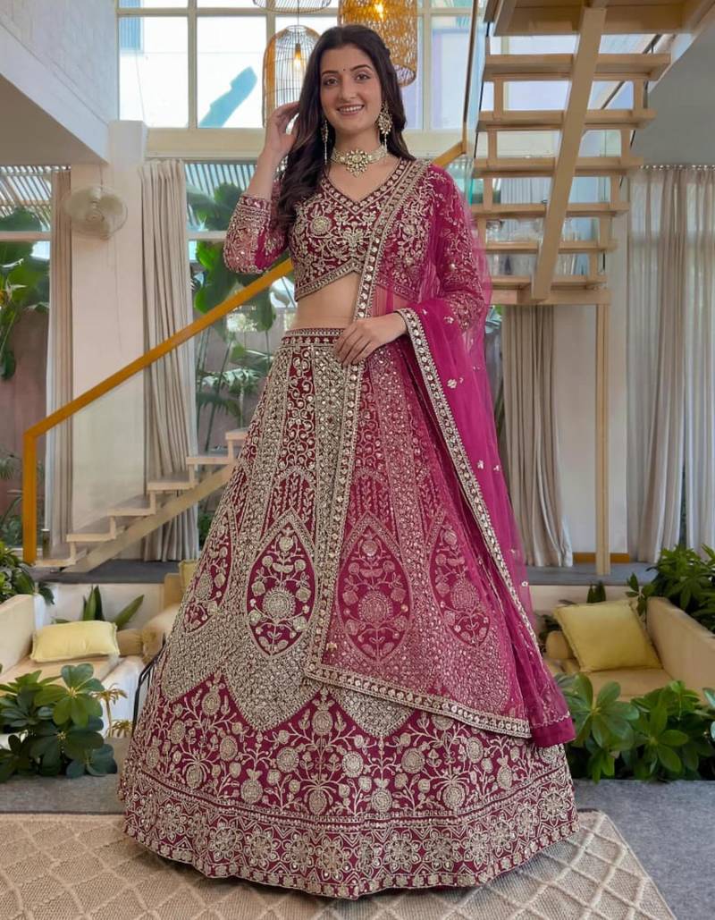 magenta net embroidered lehenga set