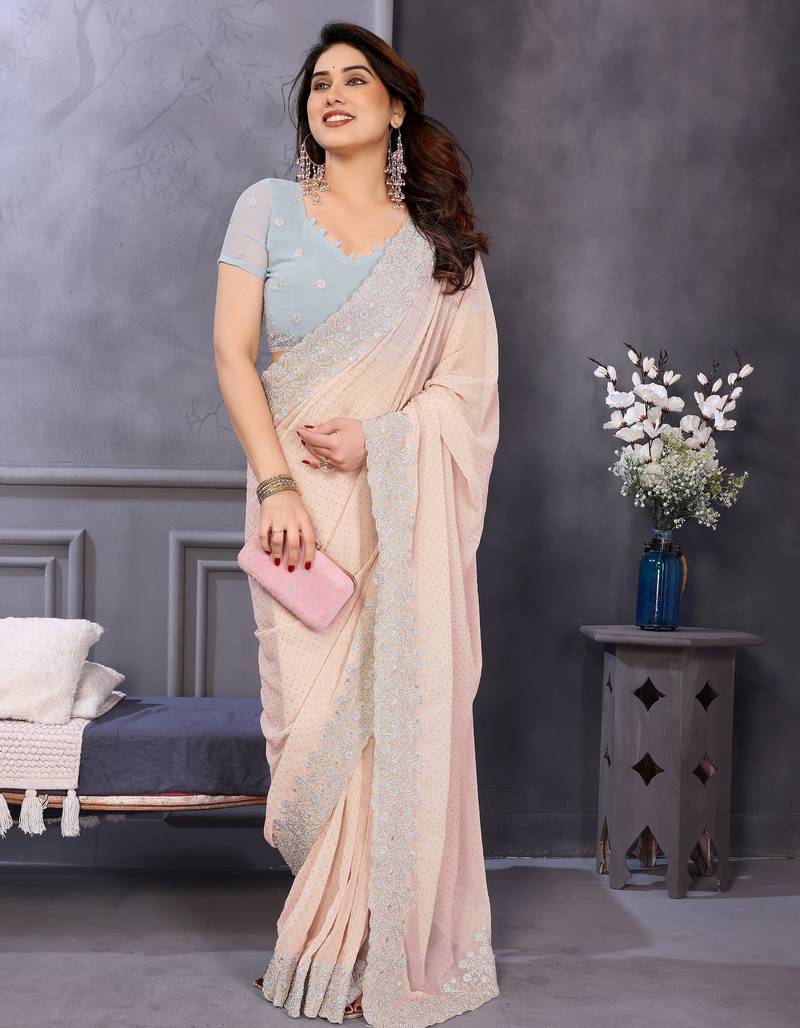 Peach soft georgette embroidered border saree with matching blouse piece