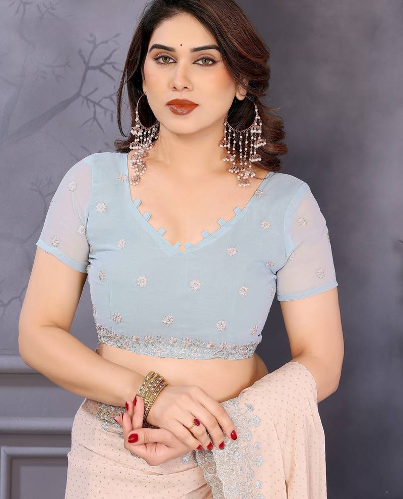 Peach soft georgette embroidered border saree with matching blouse piece