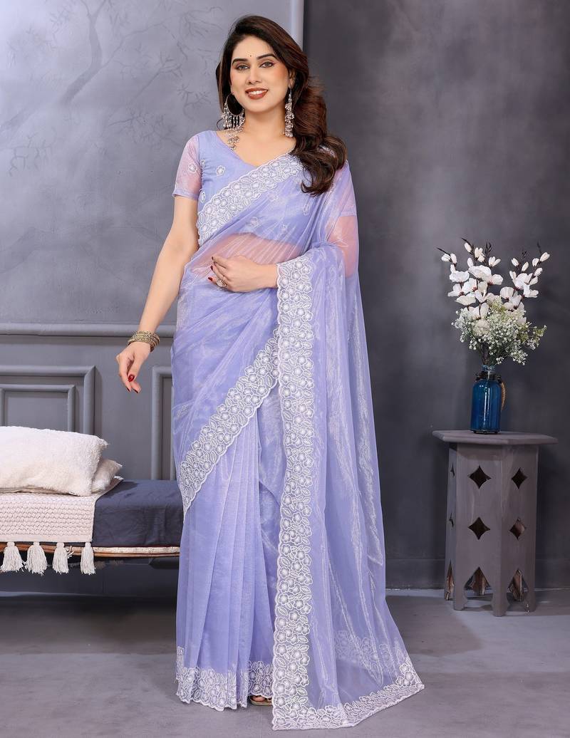 Light lavender soft twill net embroidered border saree with matching blouse piece